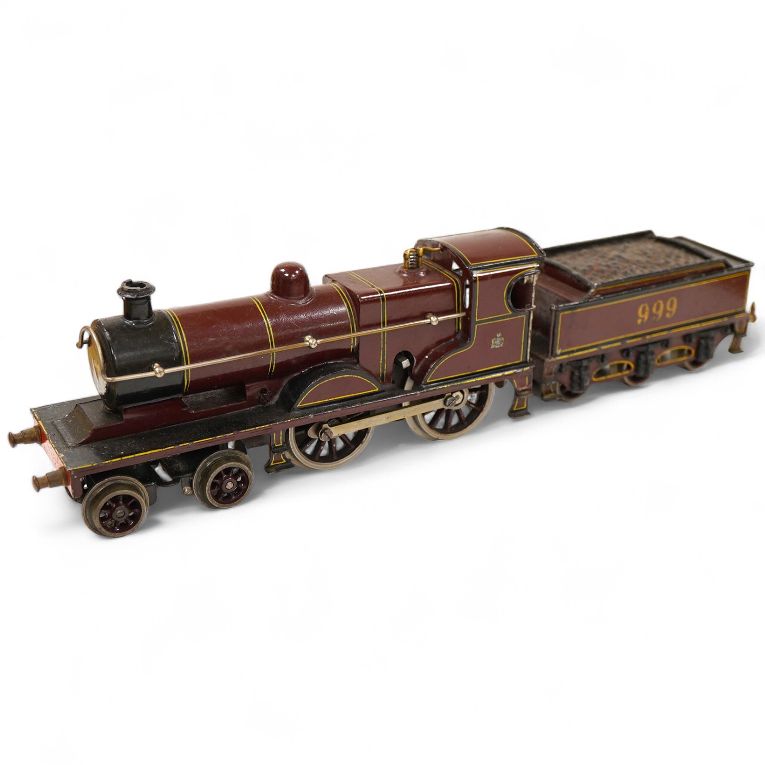 An 0 gauge Bing clockwork tinplate Midland Railway 4-4-0 tender locomotive, 999, in maroon livery with yellow and black lining and original clockwork mechanism